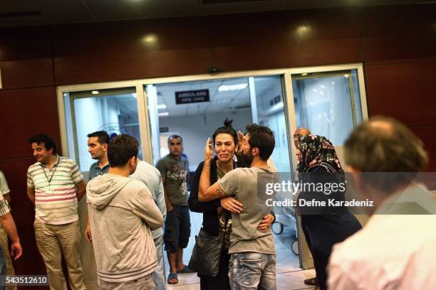 Relatives of the Ataturk Airport suicide bomb attack victims wait outside Bakirkoy Sadi Konuk Hospital, in the early hours of June 29 Turkey. Three...