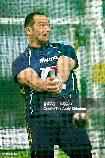 Koji Murofushi competes in the Men's Hammer Throw qualification during day one of the 100th Japan National Athletic Championships at the Paroma...