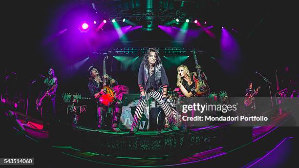 Singer Alice Cooper accompanied by the guitarists Ryan Roxie and Nita Strauss during a concert at the Alcatraz. Milan, Italy. 14th June 2016