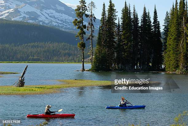 Pair of kayakers on Sparks Lake in Oregon.