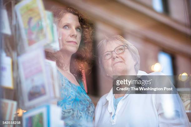 Malaprop's Bookstore/Cafe General Manager Linda-Marie Barrett and Owner Emöke B'Rácz stand for a portrait inside Malaprop's in Asheville, North...