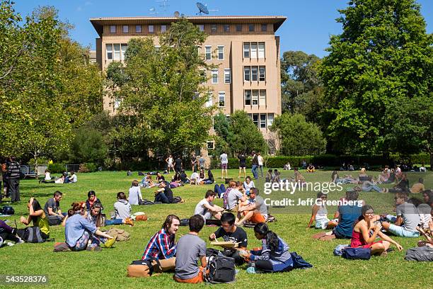 Australia, Victoria Melbourne Carlton Parkville University of Melbourne campus school South Lawn student man woman boy girl teen John Medley Building.