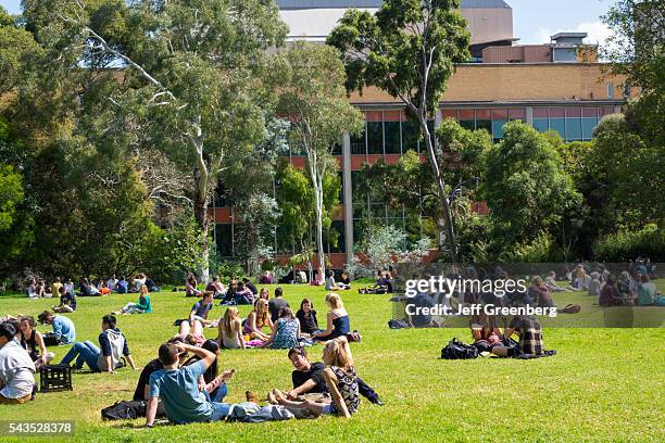 Australia, Victoria Melbourne Carlton Parkville University of Melbourne campus school South Lawn student man woman boy girl teen Baillieu Library.