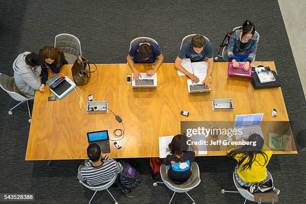 Australia, Victoria Melbourne Carlton Parkville University of Melbourne campus school Baillieu Library student man woman boy girl teen studying Asian...