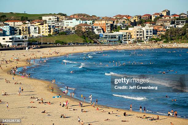 Australia, Sydney, Bondi Beach Pacific Ocean surf waves sand public North Bondi surfers.