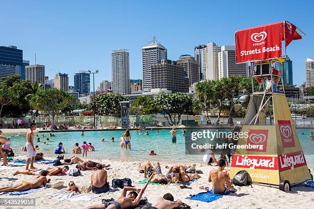 Australia, Queensland, Brisbane, Southbank Parklands Streets Beach sunbathers sand water Central Business District CBD city skyline skyscrapers...