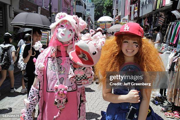Japan Tokyo Harajuku Takeshita Dori Street shopping shoppers Asian teen girl cosplay costume play.