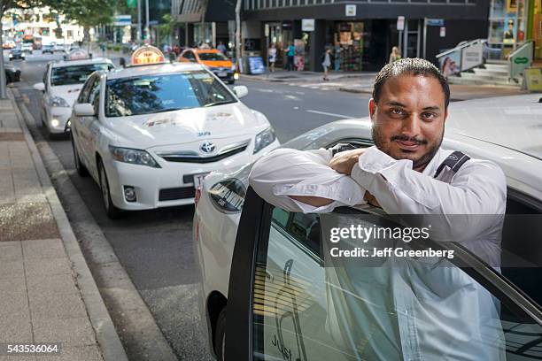 Australia, Queensland, Brisbane Central Business District, Asian Indian man taxi cab driver immigrant.