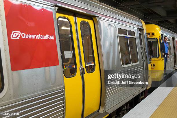 Australia, Queensland, Brisbane Central Business District, Central Station Queens landrail Rail railway train public transportation platform.