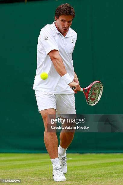 Igor Sijsling of Netherlands plays a backhand during the Men's Singles first round match against Jiri Vesely of Czech Republic on day three of the...