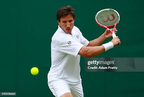 Igor Sijsling of Netherlands plays a backhand during the Men's Singles first round match against Jiri Vesely of Czech Republic on day three of the...