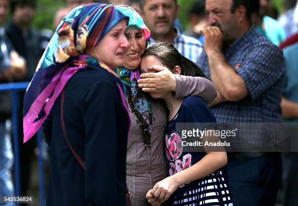 Relatives of the ones, who were wounded in the terror attack at Ataturk International Airport, cry outside the Forensic Medicine Institution in...