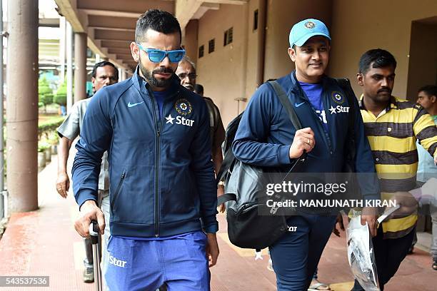 Indian cricket team captain Virat Kohli and the newly appointed head coach, Anil Kumble leave the National Cricket Academy where the Indian cricket...