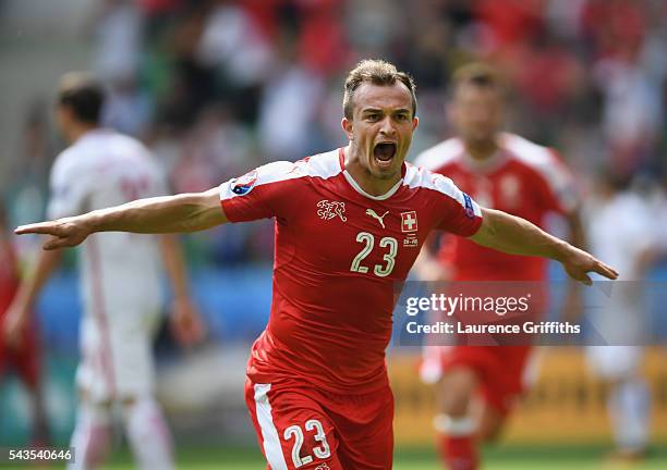 Xherdan Shaqiri of Switzerland celebrates his goal during the UEFA Euro 2016 Round of 16 match between Switzerland and Poland at Stade...