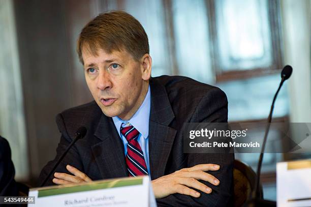 Director of the Consumer Financial Protection Bureau, Richard Cordray, delivers remarks during a public meeting of the Financial Literacy and...