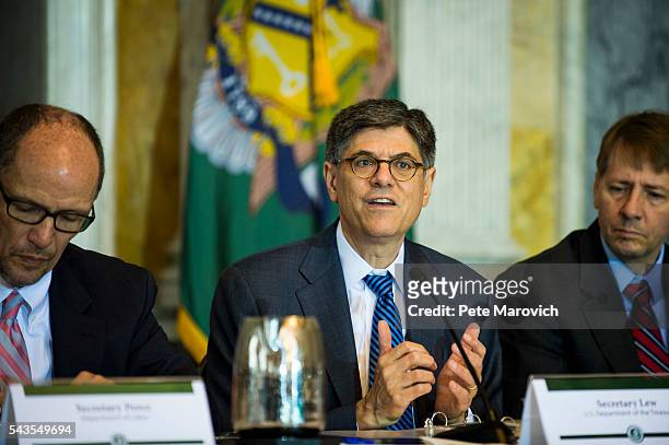 Flanked by U.S. Department of Labor Secretary, Thomas Perez and Director of the Consumer Financial Protection Bureau, Richard Cordray, Treasury...