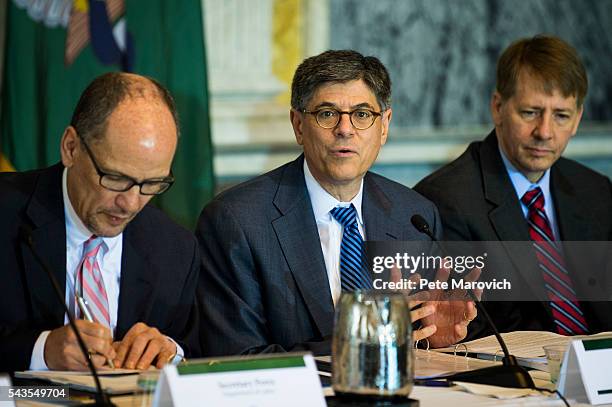 Flanked by U.S. Department of Labor Secretary, Thomas Perez and Director of the Consumer Financial Protection Bureau, Richard Cordray, Treasury...