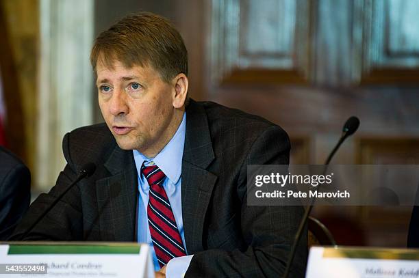 Director of the Consumer Financial Protection Bureau, Richard Cordray, delivers remarks during a public meeting of the Financial Literacy and...