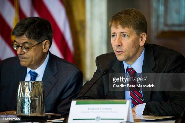 Director of the Consumer Financial Protection Bureau, Richard Cordray, delivers remarks during a public meeting of the Financial Literacy and...