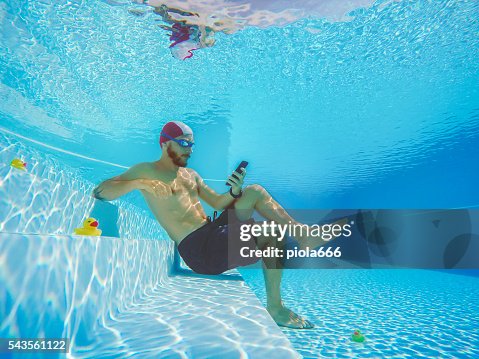 Addicted to social networking: with mobile phone underwater Addicted to social networking: with mobile phone underwater