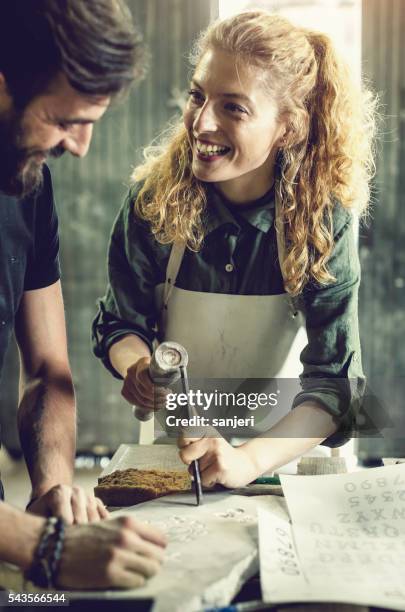 stonecutter at his workshop - stone sculptor stock pictures, royalty-free photos & images