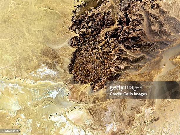 Close up satellite shot of Tin Bider crater on March 27, 2016. The carter was created by a meteorite impact, located east of In Salah, Algeria on the...