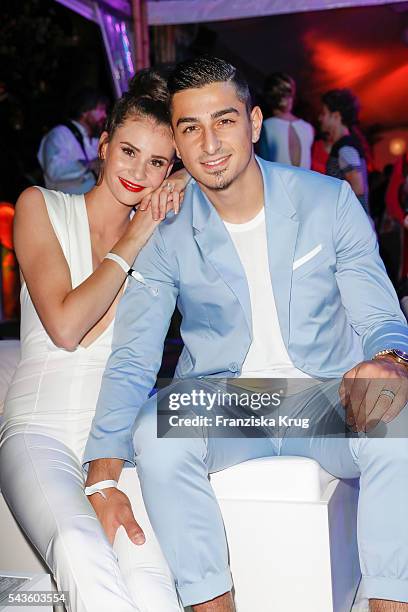 German model Betty Taube and the professional footballer Koray Guenter attend the Raffaello Summer Day 2016 to celebrate the 26th anniversary of...
