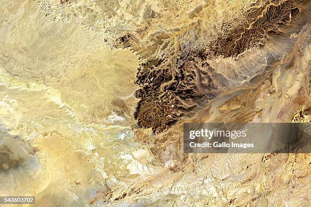 Wide angle satellite shot of Tin Bider crater on March 27, 2016. The carter was created by a meteorite impact, located east of In Salah, Algeria on...