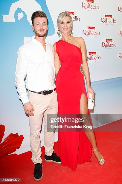 Katja Kuehne and her boyfriend soccer player Quirin Moll attend the Raffaello Summer Day 2016 to celebrate the 26th anniversary of Raffaello on June...