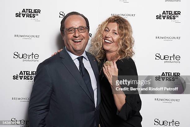 French President Francois Hollande, here with Photographer Stephanie Murat, visits "55 Politiques", Exhibition of Stephanie Murat's Pictures at...