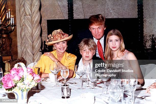 Family portrait of, from left, socialite Ivana Trump, her son Eric Trump, her former husband businessman Donald Trump, and her daughter Ivanka Trump...