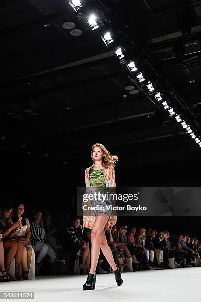 Model Maria Vvedenskaya walks the runway at the Anja Gockel show during the Mercedes-Benz Fashion Week Berlin Spring/Summer 2017 at Erika Hess...