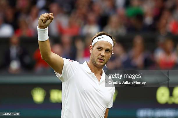 Marcus Willis of Great Britain reacts during the Men's Singles second round match against Roger Federer of Switzerland on day three of the Wimbledon...