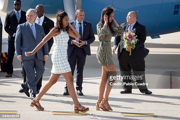 Sasha Obama and Malia Obama arrive at Torrejon Air Force Base on June 29, 2016 in Madrid. The First Lady will deliver a speech on Let Girls Learn to...