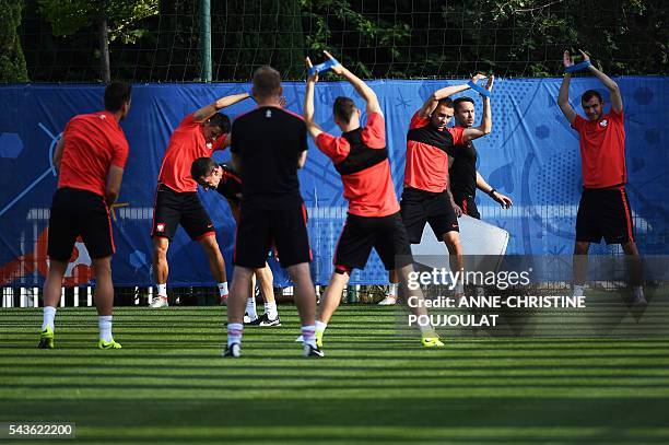 Poland's players take part in a training session at the Robert-Louis-Dreyfus stadium in Marseille, southeastern France, on June 29 on the eve of...