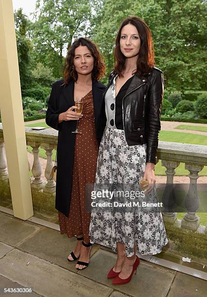 Karina Deyko and Caitriona Balfe attend the Creatures of the Wind Resort 2017 collection and runway show presented by Farfetch at Spencer House on...