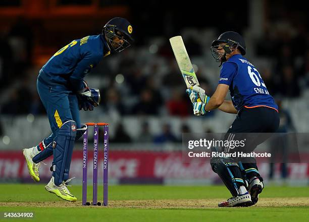 Jos Buttler of England flips the ball over the wicket keeper during the 4th Royal London ODI between England and Sri Lanka at The Kia Oval on June...