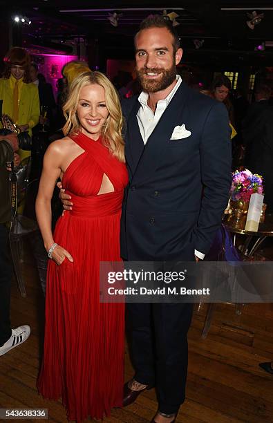 Kylie Minogue and Joshua Sasse attend the World Premiere after party of "Absolutely Fabulous: The Movie" at Liberty on June 29, 2016 in London,...