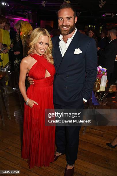 Kylie Minogue and Joshua Sasse attend the World Premiere after party of "Absolutely Fabulous: The Movie" at Liberty on June 29, 2016 in London,...