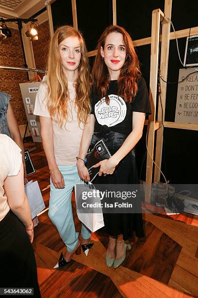 German actress Pheline Roggan and german actress Julia Malik attend the Malaikaraiss defilee during the Der Berliner Mode Salon Spring/Summer 2017 at...