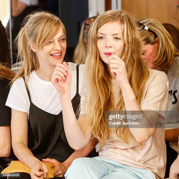 German actress Heike Makatsch and german actress Pheline Roggan attend the Malaikaraiss defilee during the Der Berliner Mode Salon Spring/Summer 2017...