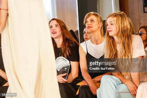 German actress Julia Malik, german actress Heike Makatsch and german actress Pheline Roggan attend the Malaikaraiss defilee during the Der Berliner...