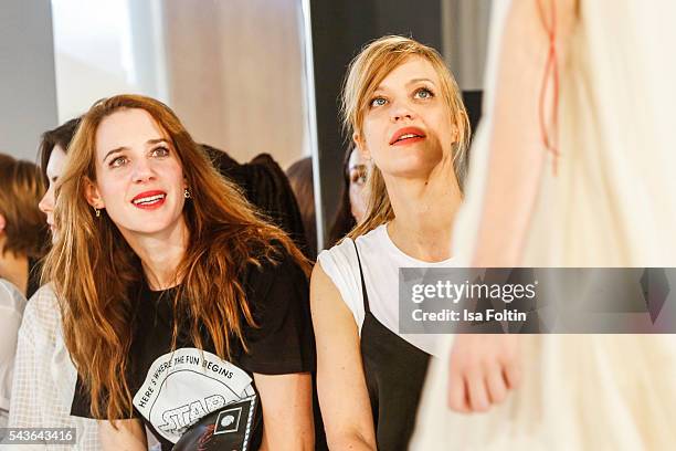 German actress Julia Malik and german actress Heike Makatsch attend the Malaikaraiss defilee during the Der Berliner Mode Salon Spring/Summer 2017 at...