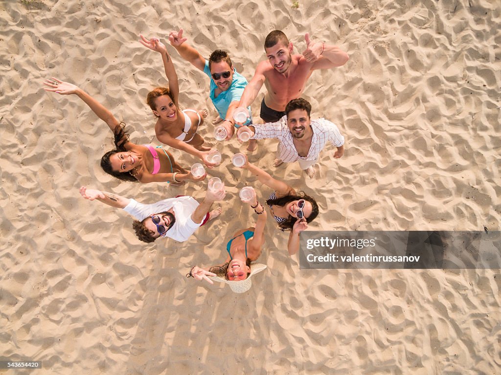 Group og young people making selfie with drone