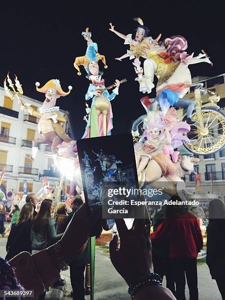 Woman take a picture with iPad in Valencia, Spain