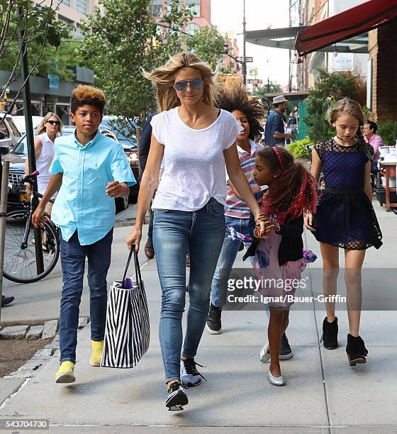 Heidi Klum is seen with her children Henry, Johan, Lou, and Helene on June 29, 2016 in New York City.