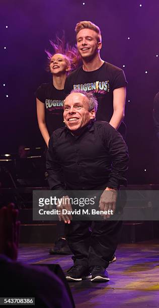 Warwick Davis takes the curtain call at the world premiere concert performance of "Eugenius!" at The London Palladium on June 29, 2016 in London,...