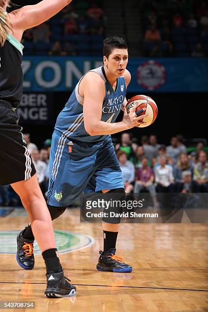 Janel McCarville of the Minnesota Lynx handles the ball against the New York Liberty on June 29, 2016 at Target Center in Minneapolis, Minnesota....
