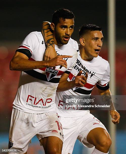 Alan Kardec and Centurion of Sao Paulo celebrate a second goal during the match between Sao Paulo and Fluminense for the Brazilian Series A 2016 at...