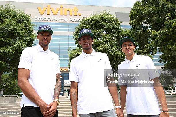 Utah Jazz Draft Picks Joel Bolomboy, Tyrone Wallace and Marcus Paige pose for a photo in front of the vivint.SmartHome Arena on June 29, 2016 in Salt...